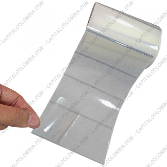 Rollos de etiquetas adhesivas y Nylon Textil, Marca: CapitalColombia - Rollo de etiquetas transparentes de 1.000 etiquetas a dos columnas 10cms x 5cms (100x50mm) con marca negra